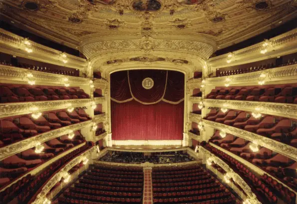 Click to enlarge historical photograph Historical view of the interior of the Gran Teatre del Liceu in Barcelona, with ceiling and curtain designed by José Roger Balet's uncle Domènec Balet